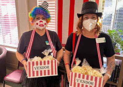 caregivers dressed as circus vendors at Willows Post Acute